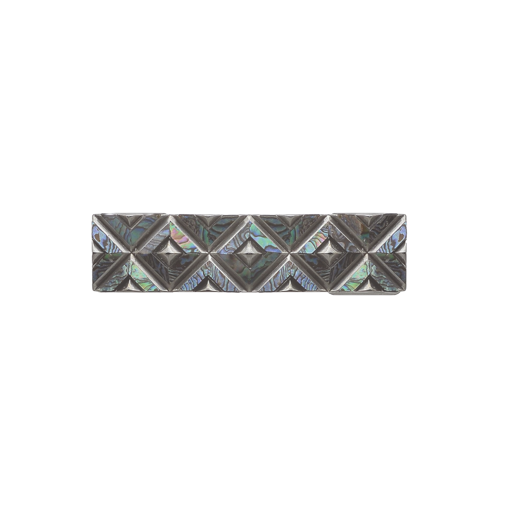 Rectangular silver-tone belt buckle with a geometric diamond pattern and iridescent mother-of-pearl inlay, a modern Italian design fashion accessory.