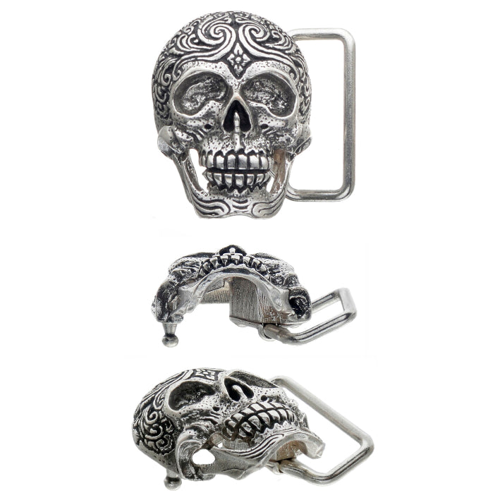 Ornate silver skull belt buckle with a detailed floral design on the skull's forehead, a bold and unique fashion accessory with a statement-making Italian design.