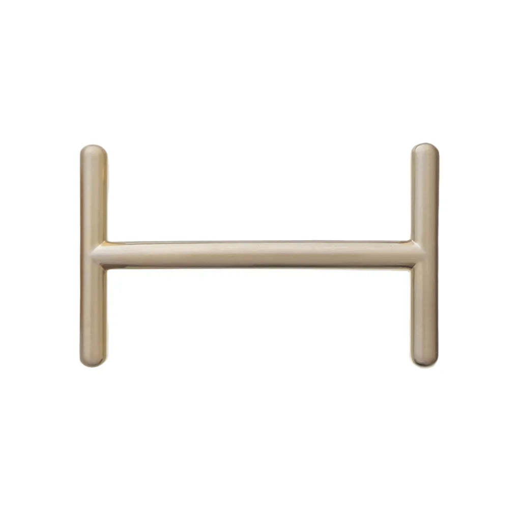 Light gold belt buckle center bar hardware for strap attachment