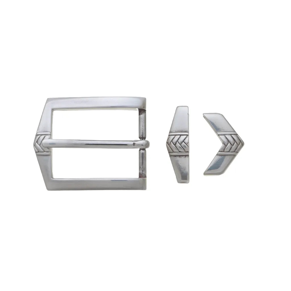 Modern three-piece polished silver belt buckle set featuring a rectangular frame, matching keeper, and chevron-engraved accents on each piece.