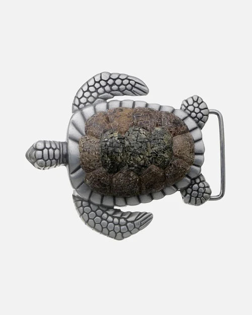 Decorative turtle buckle, silver metal with cracked shell-style inlay on back, isolated