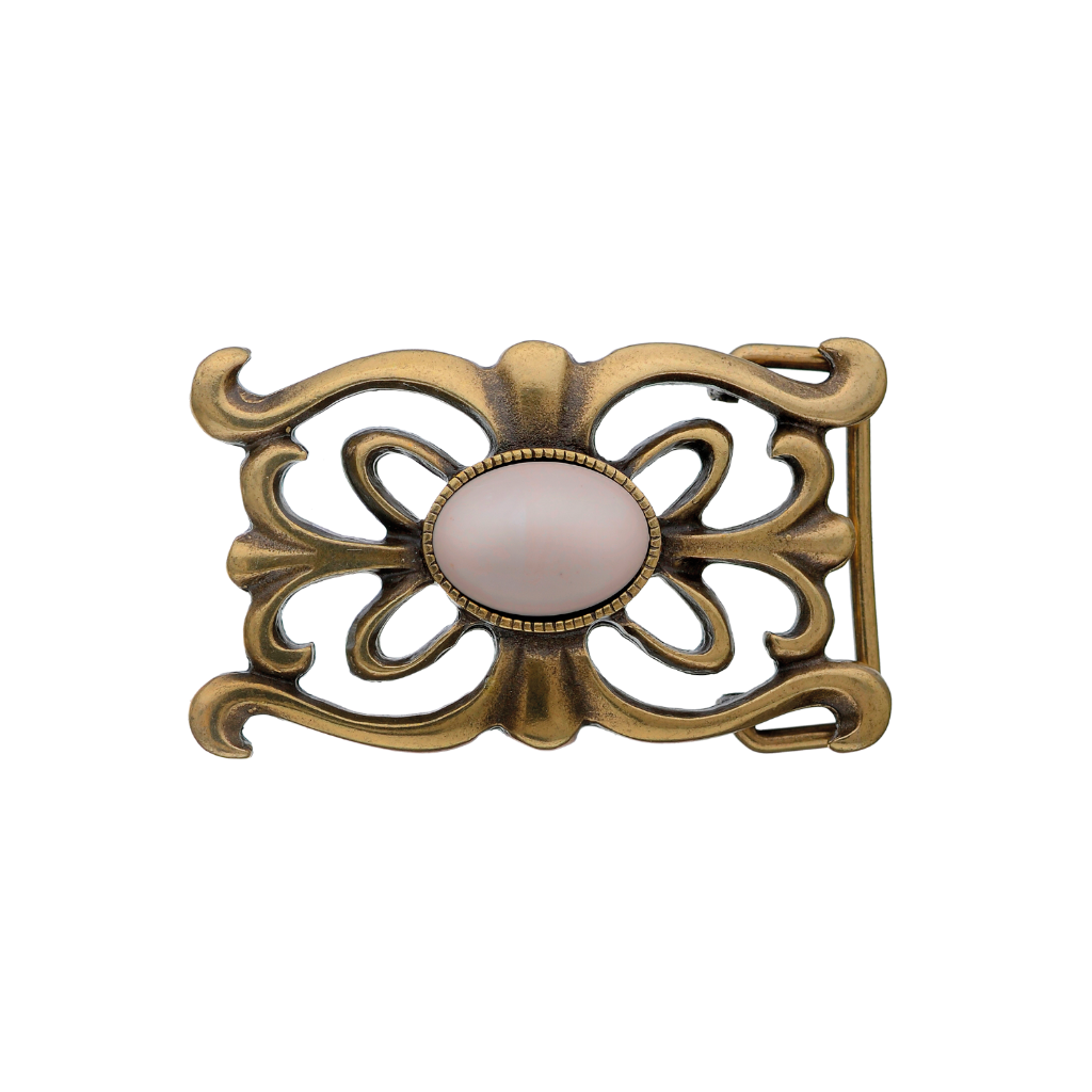 Oval-shaped brushed brass belt buckle with a detailed floral and filigree design and a large light-colored stone centerpiece, a stylish fashion accessory with a beautiful Italian design.

